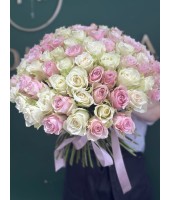 Bouquet of 101 white and pink roses, tied with a ribbon