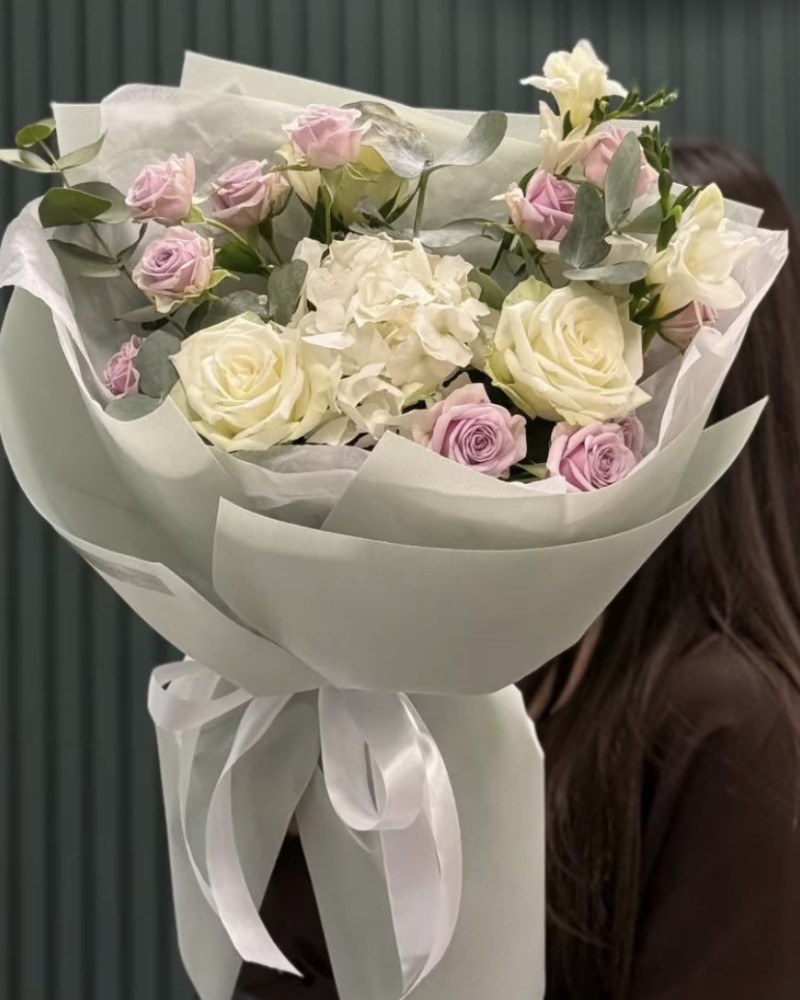 Author's bouquet with hydrangea, roses and freesia